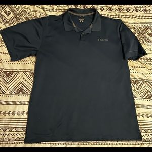 (1) Columbia polo size XL in navy blue